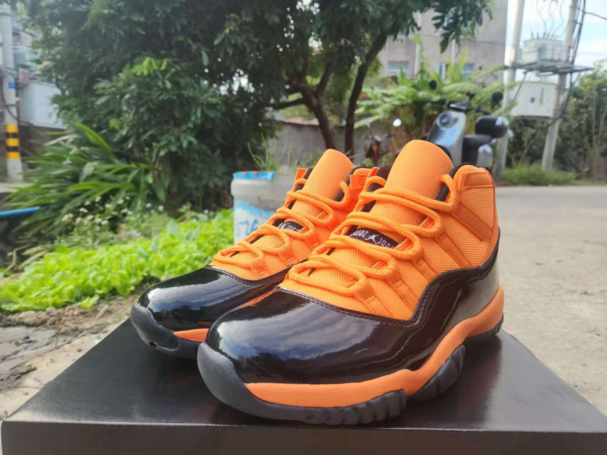 Air Jordan 11 Retro Orange, Red & Black Sneakers