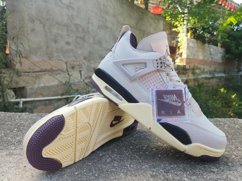 A Ma Maniére x Air Jordan 4 Brown & Pink Sneakers