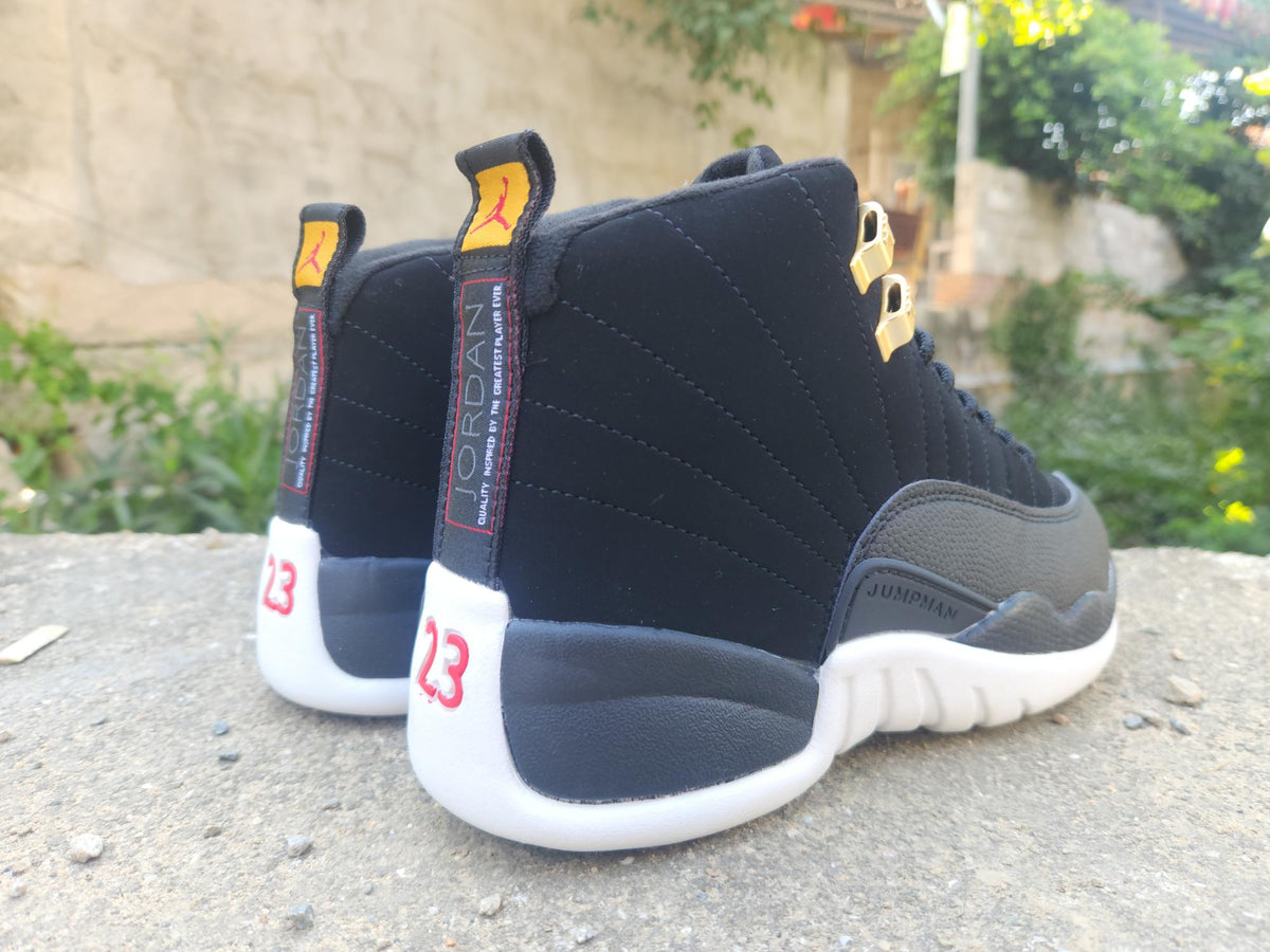 Air Jordan 12 Retro Black, White & Gold Sneakers