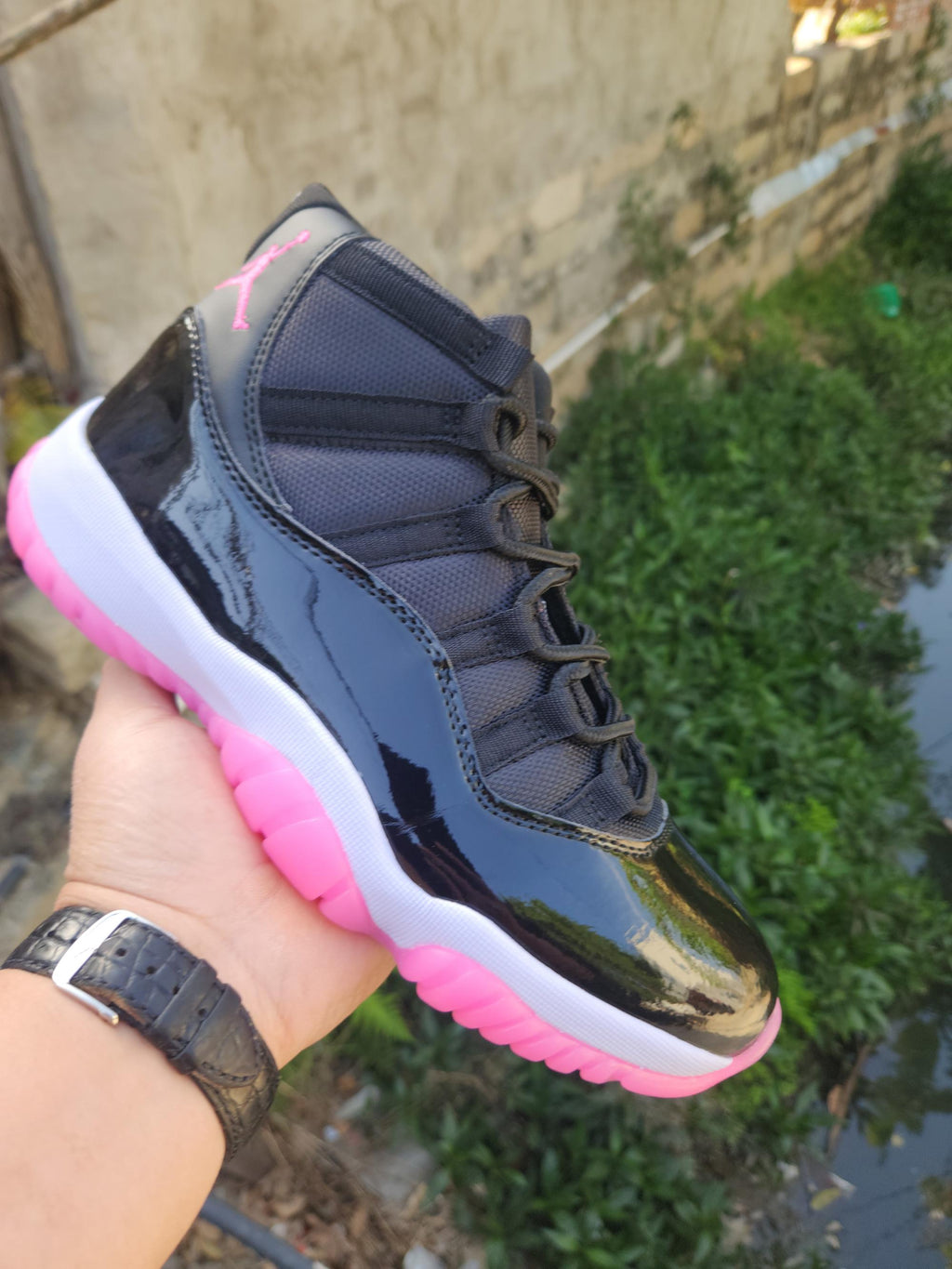 Air Jordan 11 Retro Black & Rose Red Sneakers