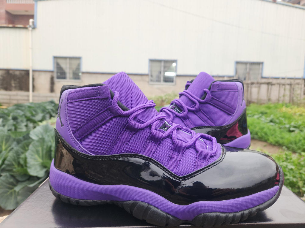 Air Jordan 11 Retro Black & Purple Sneakers