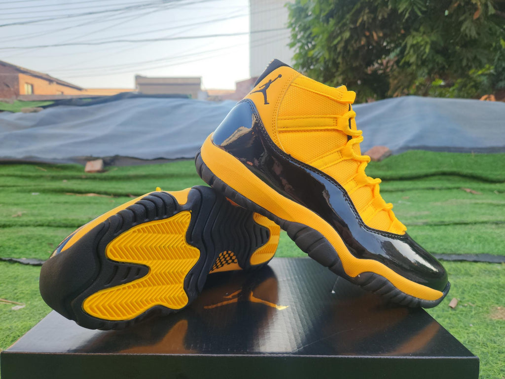 Air Jordan 11 Orange, Yellow & Black Sneakers