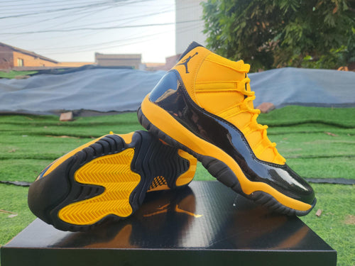 Air Jordan 11 Orange, Yellow & Black Sneakers