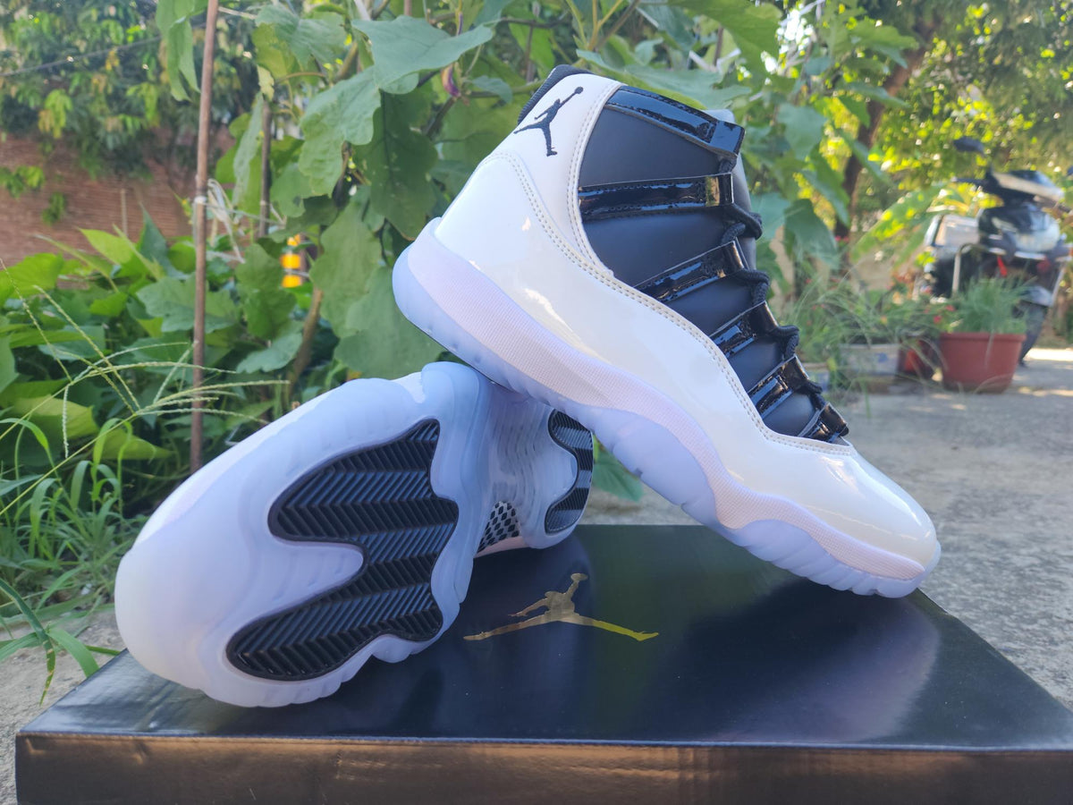 Air Jordan 11 New White & Black Sneakers