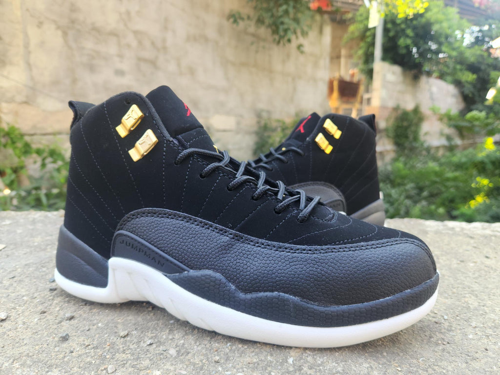 Air Jordan 12 Retro Black, White & Gold Sneakers