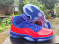 Air Jordan 11 Red & Royal Blue Sneakers