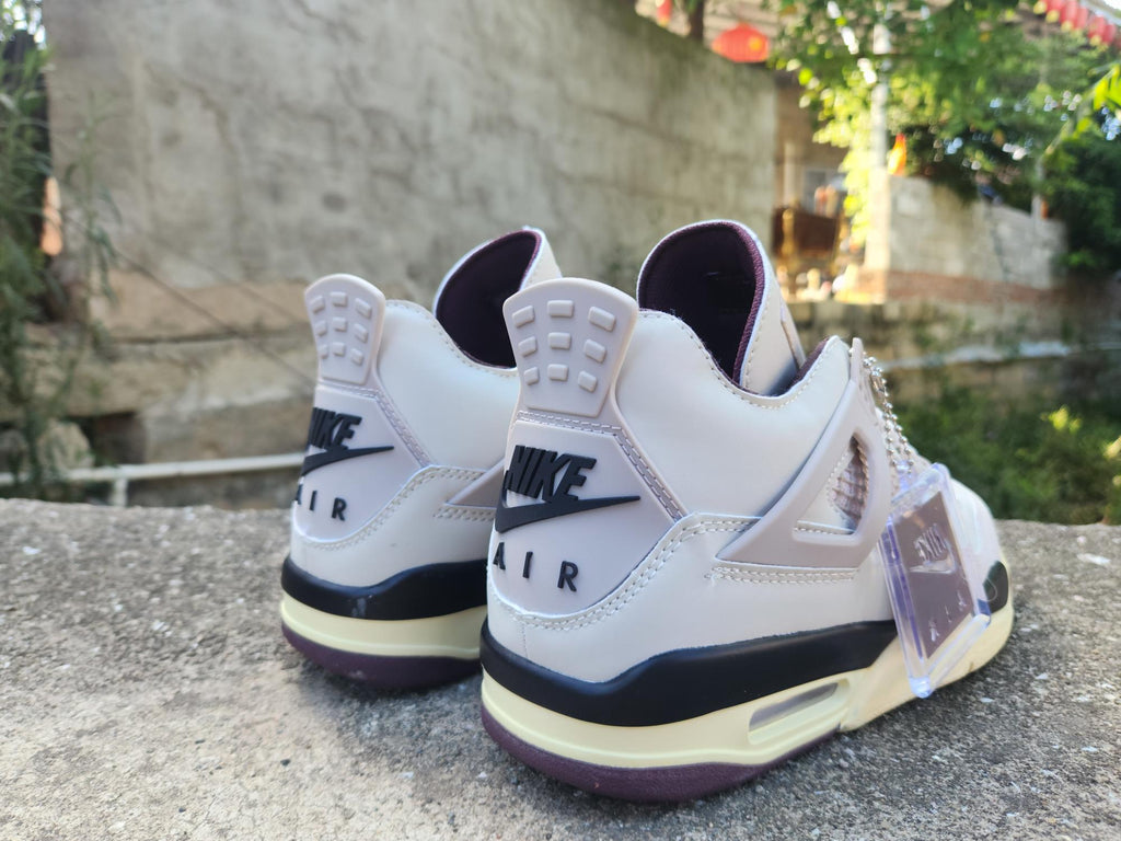 A Ma Maniére x Air Jordan 4 Brown & Pink Sneakers