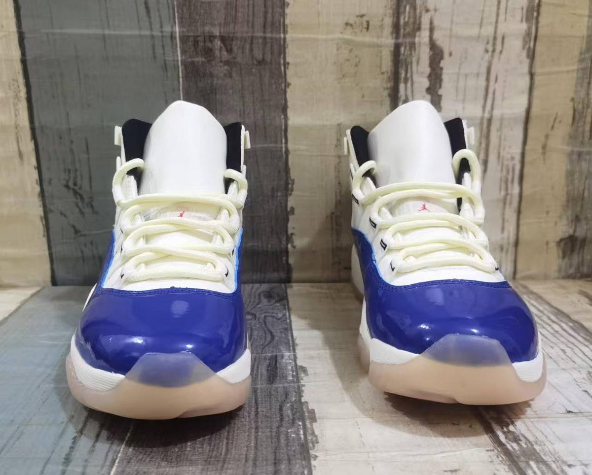 Air Jordan 11 Retro White, Blue & Red Sneakers