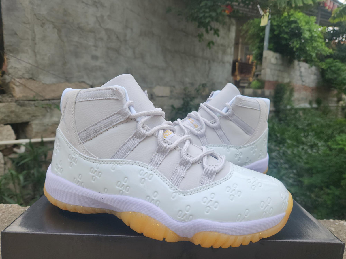 Air Jordan 11 Retro High-Frequency White & Light Yellow Sneakers