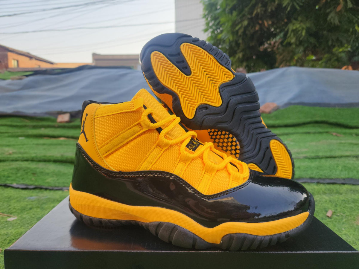 Air Jordan 11 Orange, Yellow & Black Sneakers