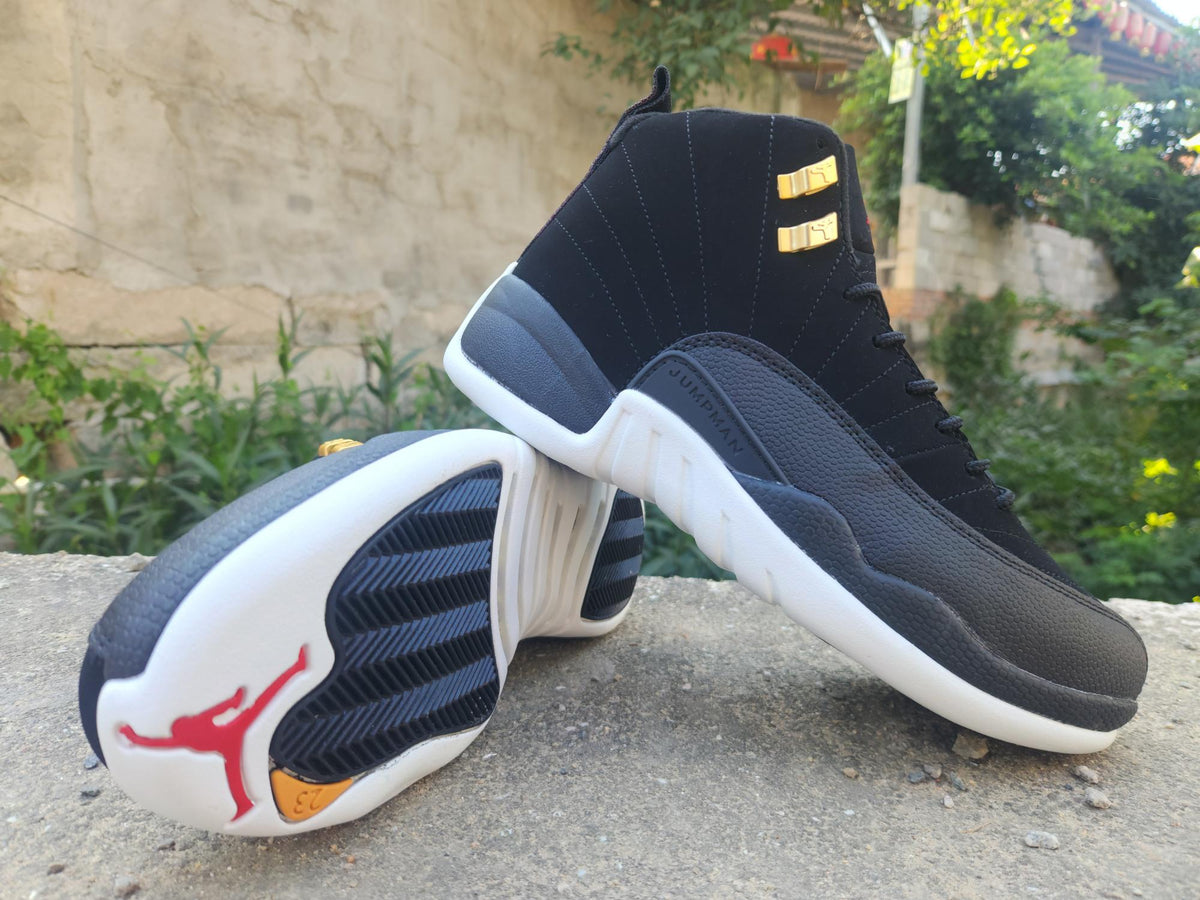 Air Jordan 12 Retro Black, White & Gold Sneakers
