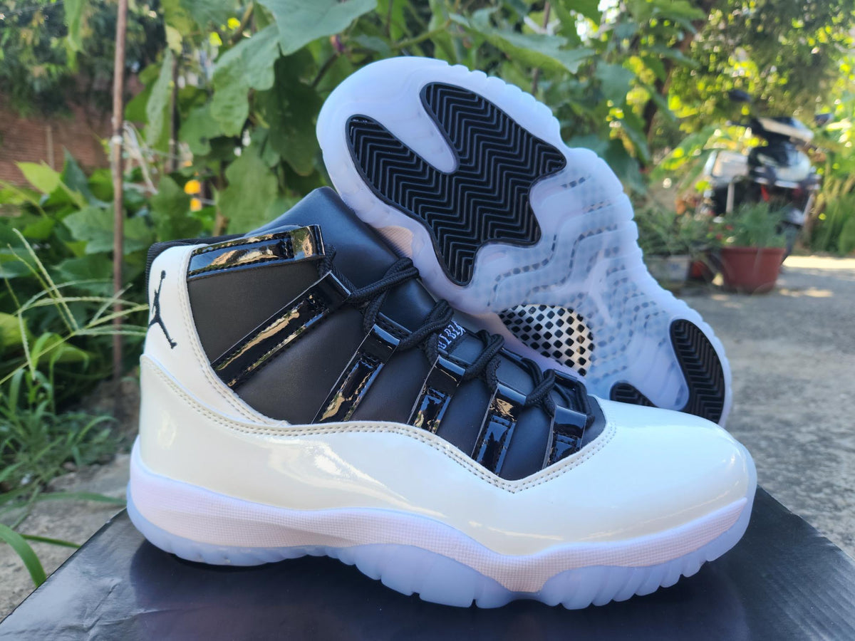 Air Jordan 11 New White & Black Sneakers