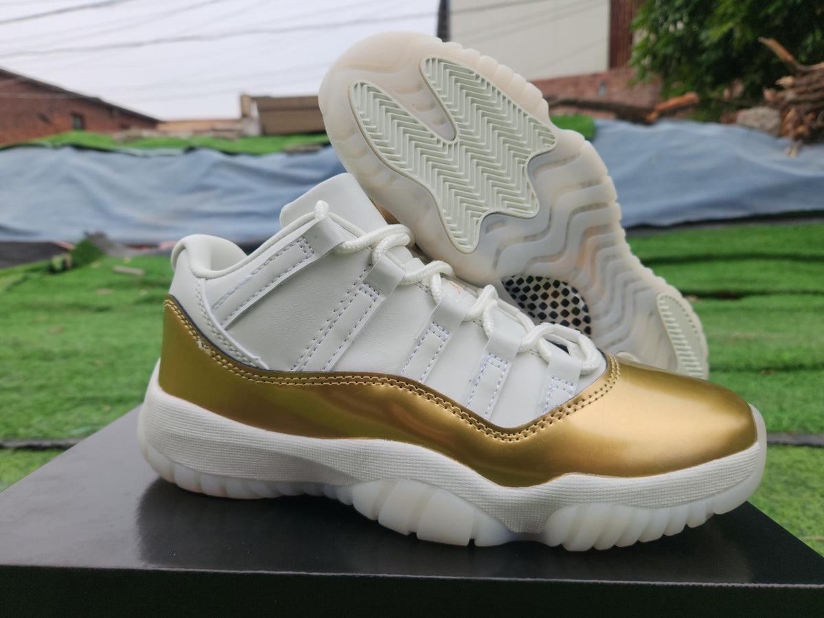 Air Jordan 11 Low White & Gold Sneakers