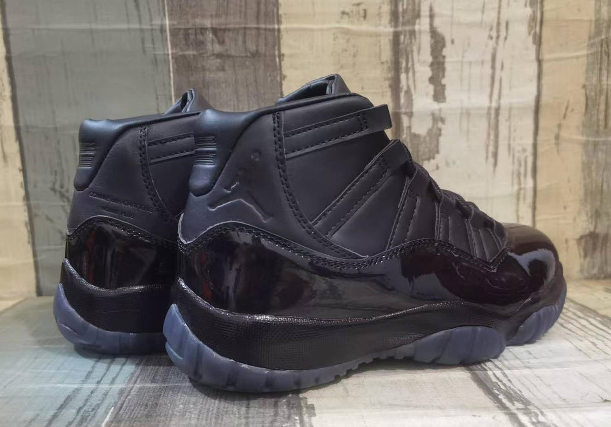 Air Jordan 11 Black & White Sneakers