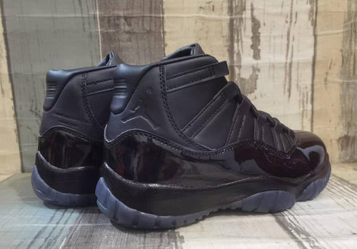 Air Jordan 11 Black & White Sneakers