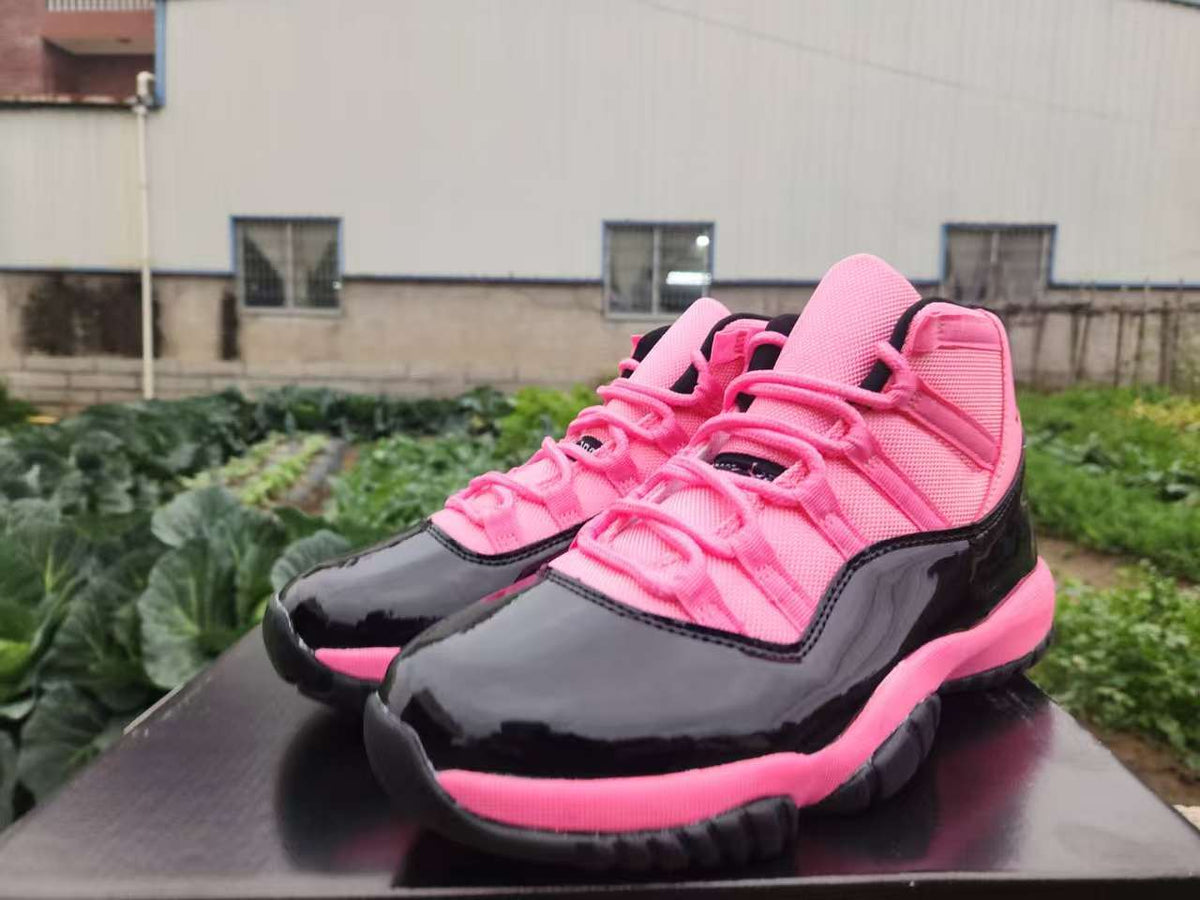 Air Jordan 11 Retro Black & Pink Sneakers