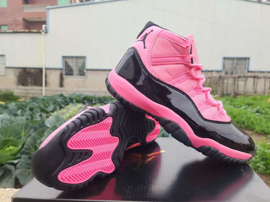 Air Jordan 11 Retro Black & Pink Sneakers