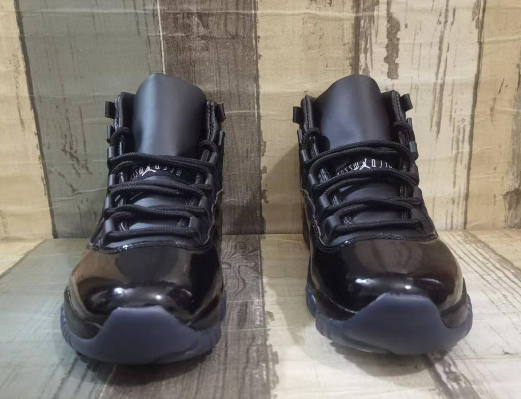 Air Jordan 11 Black & White Sneakers