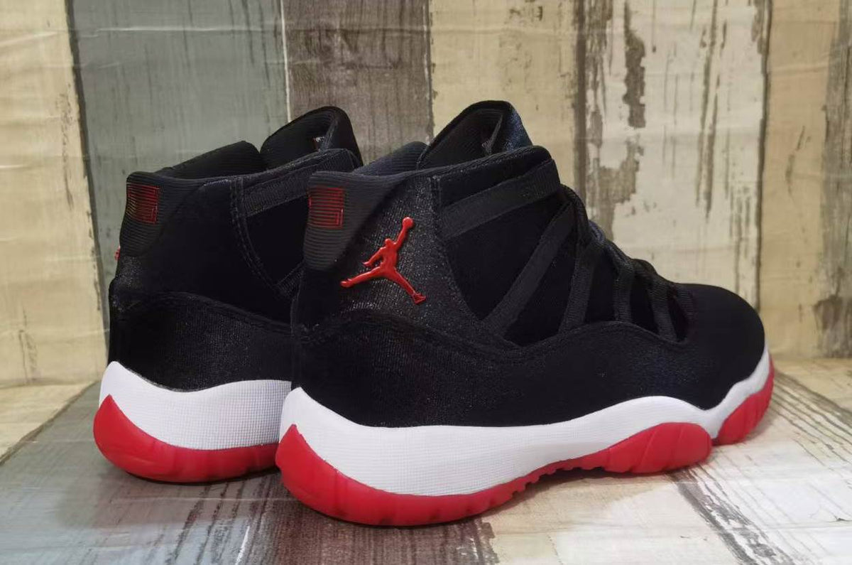 Air Jordan 11 Black & Red Velvet Sneakers
