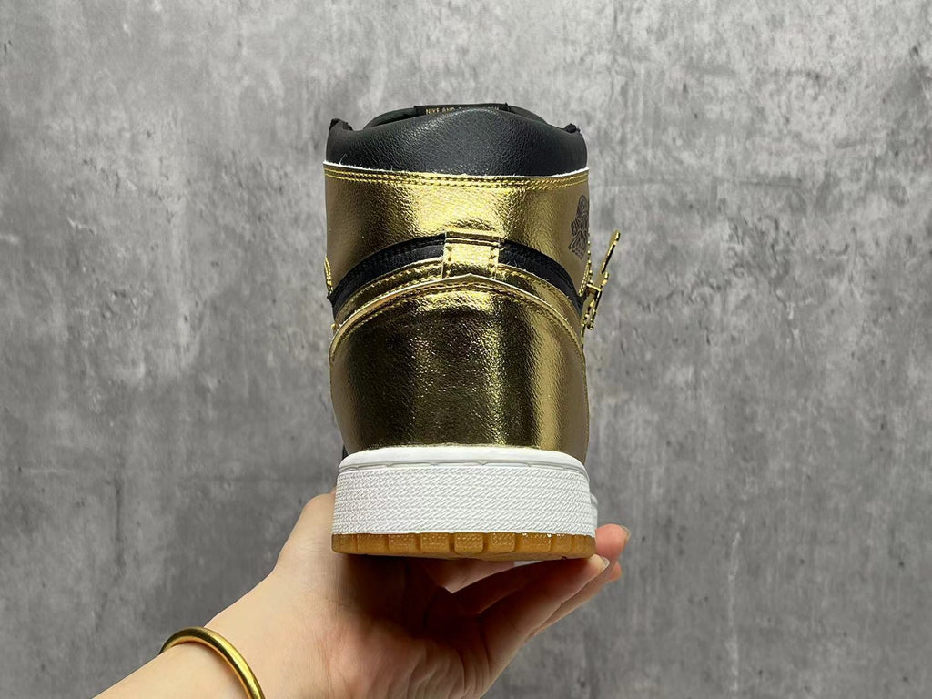 Air Jordan 1 Black & Gold Sneakers