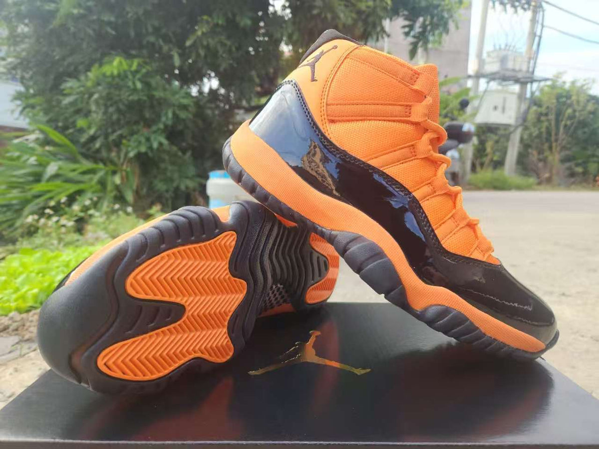 Air Jordan 11 Retro Orange, Red & Black Sneakers