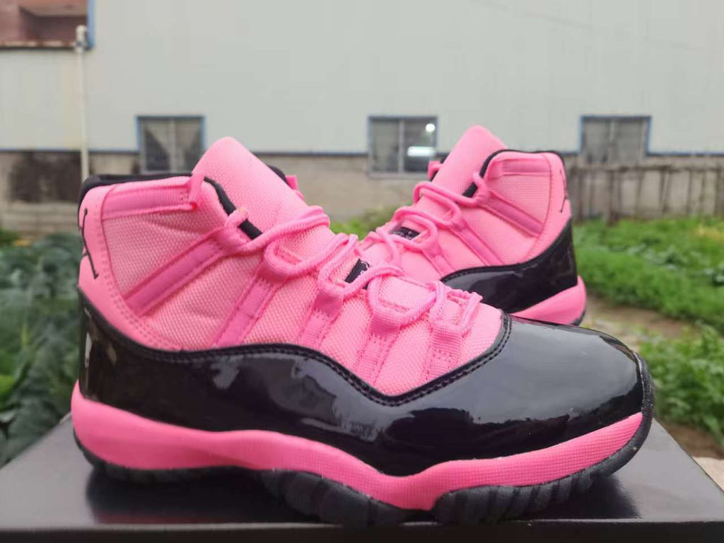 Air Jordan 11 Retro Black & Pink Sneakers