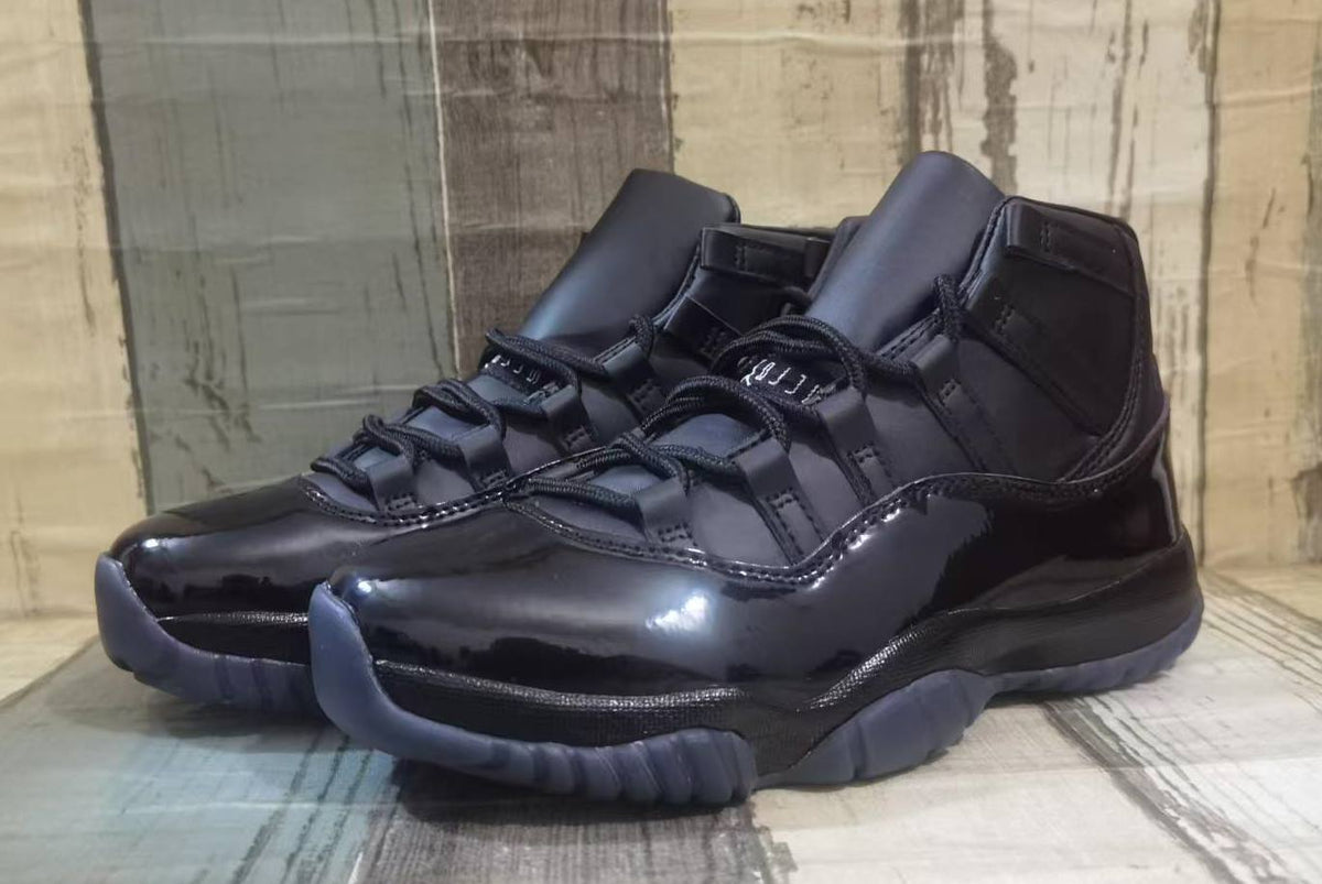 Air Jordan 11 Black & White Sneakers